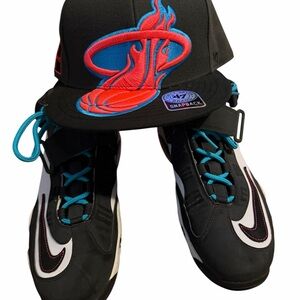 Nike Men’s Black White Sneakers with Teal Laces and Red Accents